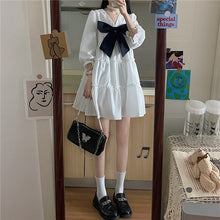 Summer Knee-Length White Dress with Large Black Bow